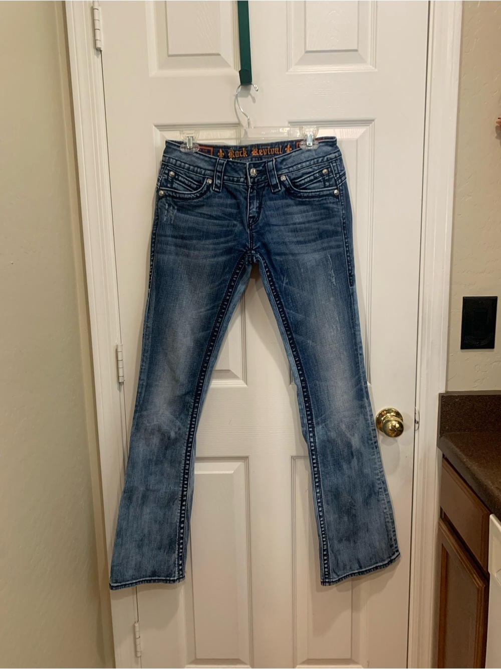 Rock Revival Women’s Distressed Blue Flare Jeans